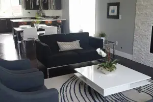 Dark walnut-toned hardwood floor, living room