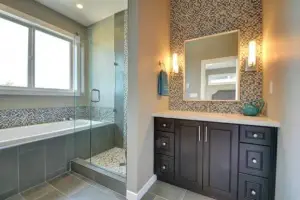 Gray slate-look porcelain tile floor and tub surround, bathroom