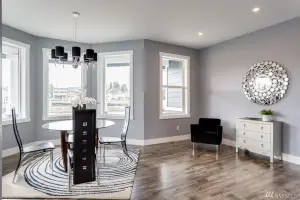 Rustic gray-brown wood-look plank floor, dining room