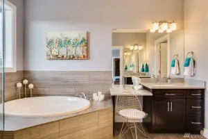 Driftwood wood-look tile floor and tub surround, primary bath