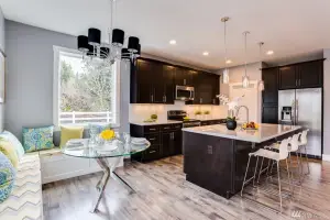 Weathered gray wood-look plank floor, kitchen and dining