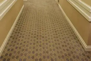 Geometric patterned broadloom carpet, commercial corridor