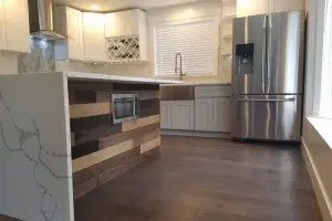 Dark hand-scraped hardwood plank floor, kitchen