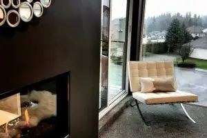 Textured gray loop carpet, sitting corner with see-through fireplace