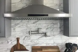 Carrara marble subway-tile backsplash, kitchen