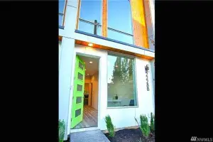 Light wood-look plank floor, modern townhome entry